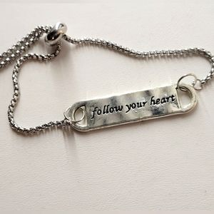 Handmade 1 of a kind bolo bracelet follow your heart.